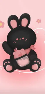 Black bunny with pink scarf on pastel background.