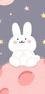 Cute bunny sitting on a pink moon with stars and a crescent moon.