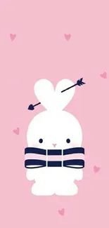 Cute white bunny with hearts on a pink background.