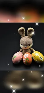 Cute knitted bunny with Easter eggs on black background.