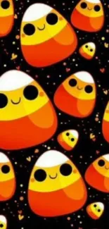 Cheerful candy corn wallpaper with bright orange and cute faces.