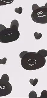 Cute cartoon wallpaper with black and white animal faces.