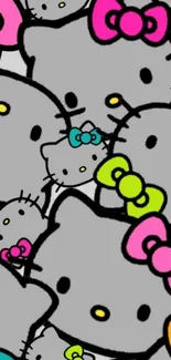 Cute cartoon cats with colorful bows wallpaper.