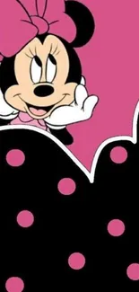 Adorable cartoon character on pink polka dot wallpaper.