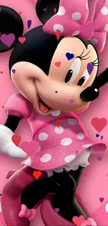 Cute cartoon mouse in pink polka-dot dress wallpaper.