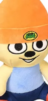 Vibrant cartoon plush character with an orange hat and blue outfit.