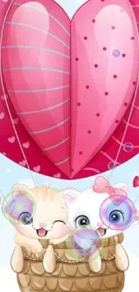 Cute cats in a pink heart balloon basket.