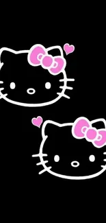 Cute cat faces with pink bows on black background.