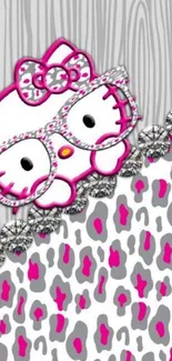 Cute cat wallpaper with pink patterns and leopard print on a mobile phone screen.