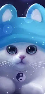 Cute white cat with blue hat and yin-yang charm.