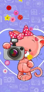 Cute cartoon cat holding a camera on a purple background.