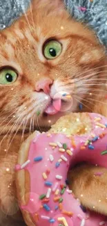 Orange cat holding pink donut with sprinkles.