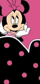 Cartoon character with pink and black polka dot background wallpaper.