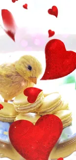 A fluffy chick with macarons and red hearts on a mobile wallpaper.