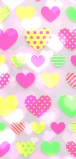 Colorful hearts wallpaper with pink, green, and yellow hues.