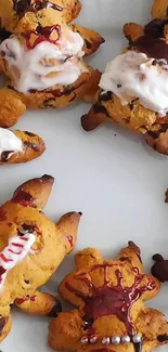 Cute cartoon-shaped cookies on a plate.