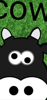 Cartoon cow on green grass background wallpaper.