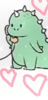 Adorable pastel green dinosaur with pink hearts in a cartoon style.