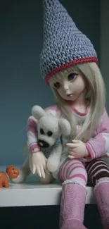 Cute doll in a blue hat with a teddy bear and small toy.