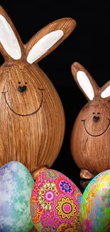 Wooden bunny figures with colorful Easter eggs.