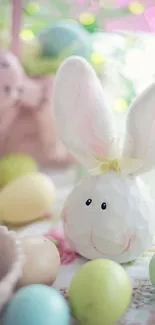 Cute Easter bunny with pastel eggs, perfect for spring wallpaper.