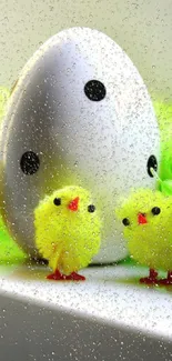 Adorable Easter chicks with colorful egg.