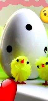 Cute Easter theme wallpaper with chicks and polka-dotted egg.