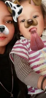 Mother and toddler with dog face filters, playful and cute.