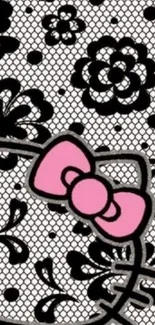 Black and white floral wallpaper with a pink bow accent.