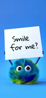 Adorable fuzzy creature with a "Smile for me?" sign on a blue background.