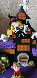 Cute Halloween cartoon wallpaper with haunted house and characters.