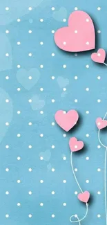 Cute pink heart balloons on a light blue polka dot background wallpaper.