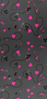 Dark background with pink heart pattern and swirls.