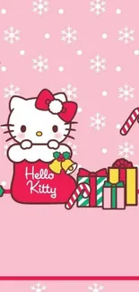 Cute holiday cat with gifts on a pink wallpaper.