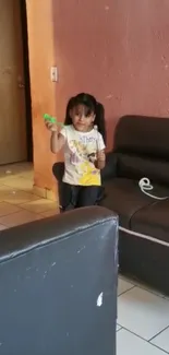 Cute child playing indoors with a toy.