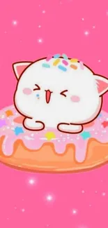 Kawaii white cat sitting on a colorful donut with a pink background.