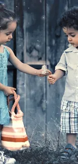 Two cute kids sharing a moment with a rustic backdrop.