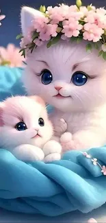 Two white kittens with floral crown in blue blanket, surrounded by pink blossoms.