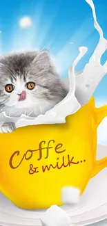 Playful kitten in a yellow coffee mug with milk splashing.