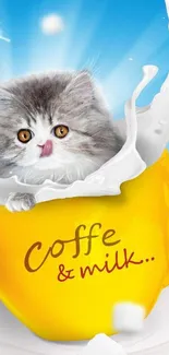 Cute kitten in yellow mug with splashing milk.