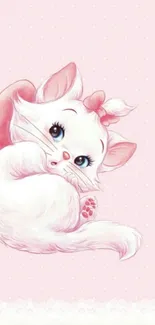 Cute kitten on a pink polka dot background wallpaper.