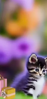 Adorable kitten with colorful gifts in a vibrant nature setting.