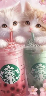 Two fluffy kittens drinking colorful beverages with cherry blossoms.