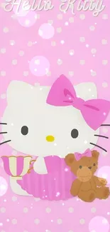 Cute kitty and teddy bear on pink background.