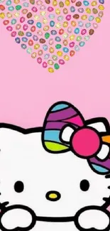 Cute Hello Kitty wallpaper with pink heart and colorful bow.