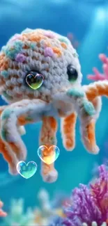 Knitted octopus with heart bubbles amidst colorful corals.