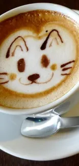 Cute cat face latte art in a coffee cup.