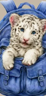 Cute leopard cub in blue backpack wallpaper.