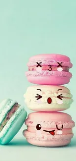 Cute macaron trio with animated faces.