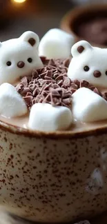 Cute bear-shaped marshmallows in hot chocolate mug.